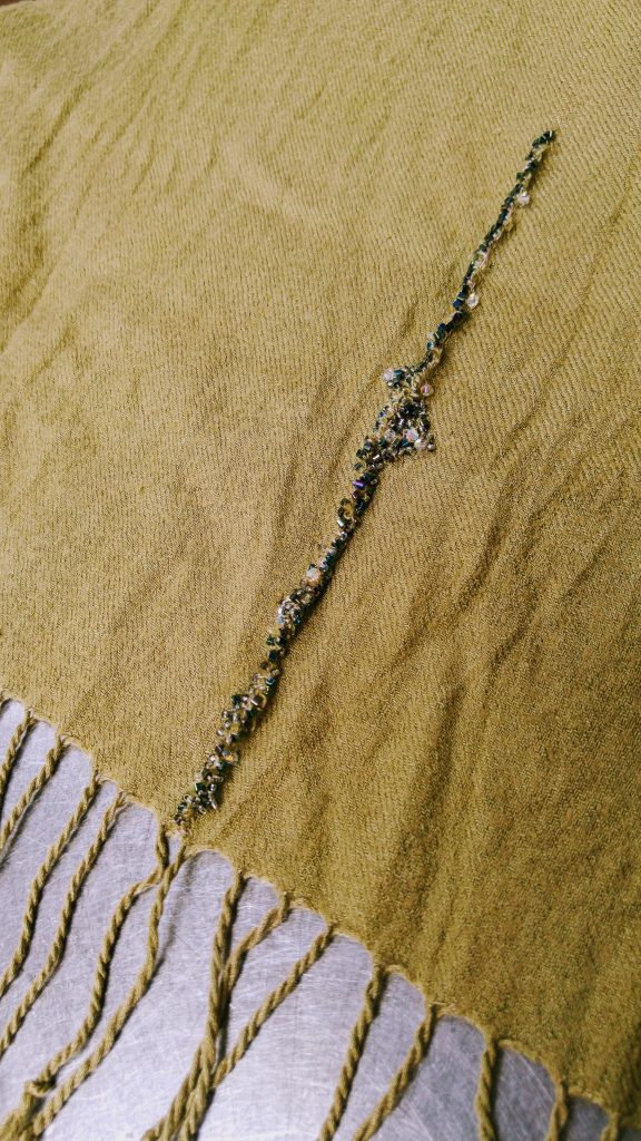 photo of kintsugi scarf repaired with crystal beads