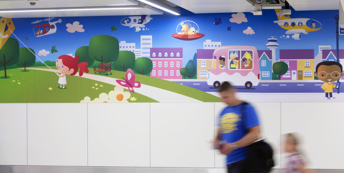 a photo of a cartoon mural in Gatwick Airport family departure lounge.